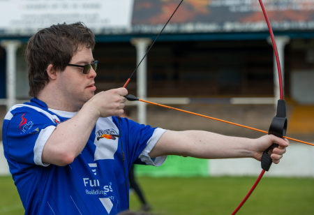 Young man playing archery