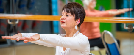 Older woman exercising indoors